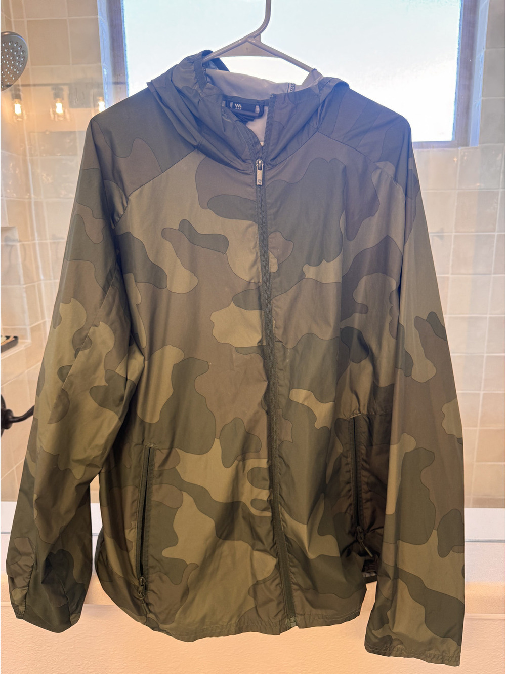 Camo hooded windbreaker jacket